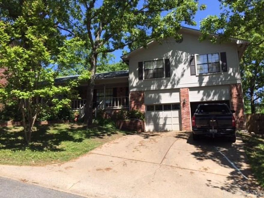 Open floor plan, updated kitchen, new roof, floored attic storage, guest bedroom separate with own bath, nice deck and large concrete patio. Sold before listed.