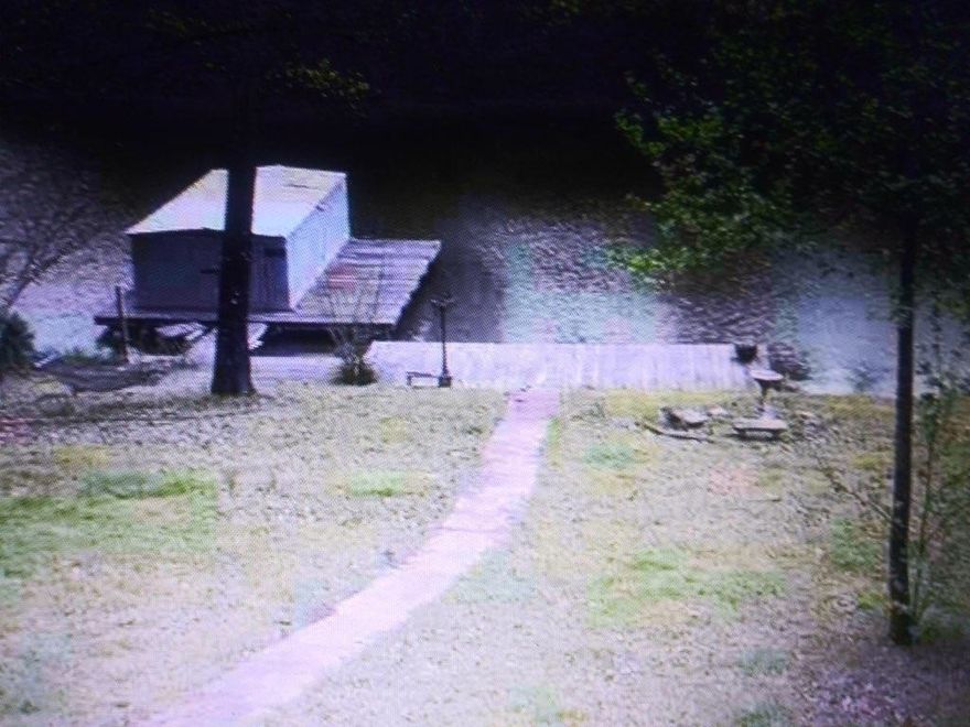 BEAUTIFUL SETTING ON A SMALL SLOPE TO THE WATERS EDGE,3 SECONDS TO THE MAIN CHANNEL,THERE IS A EXTRA ROOM THAT COULD BE A 4TH BEDROOM BUT NO CLOSET RIGHT NOW.WOOD BURNING FIRE PLACE,EAT IN KITCHEN OR FORMAL DINNING ROOM.4 MILES TO THE BYPASS.HAS A 2 CAR GARAGE.THAT COULD BE MADE INTO A BIG MASTER SUITE.