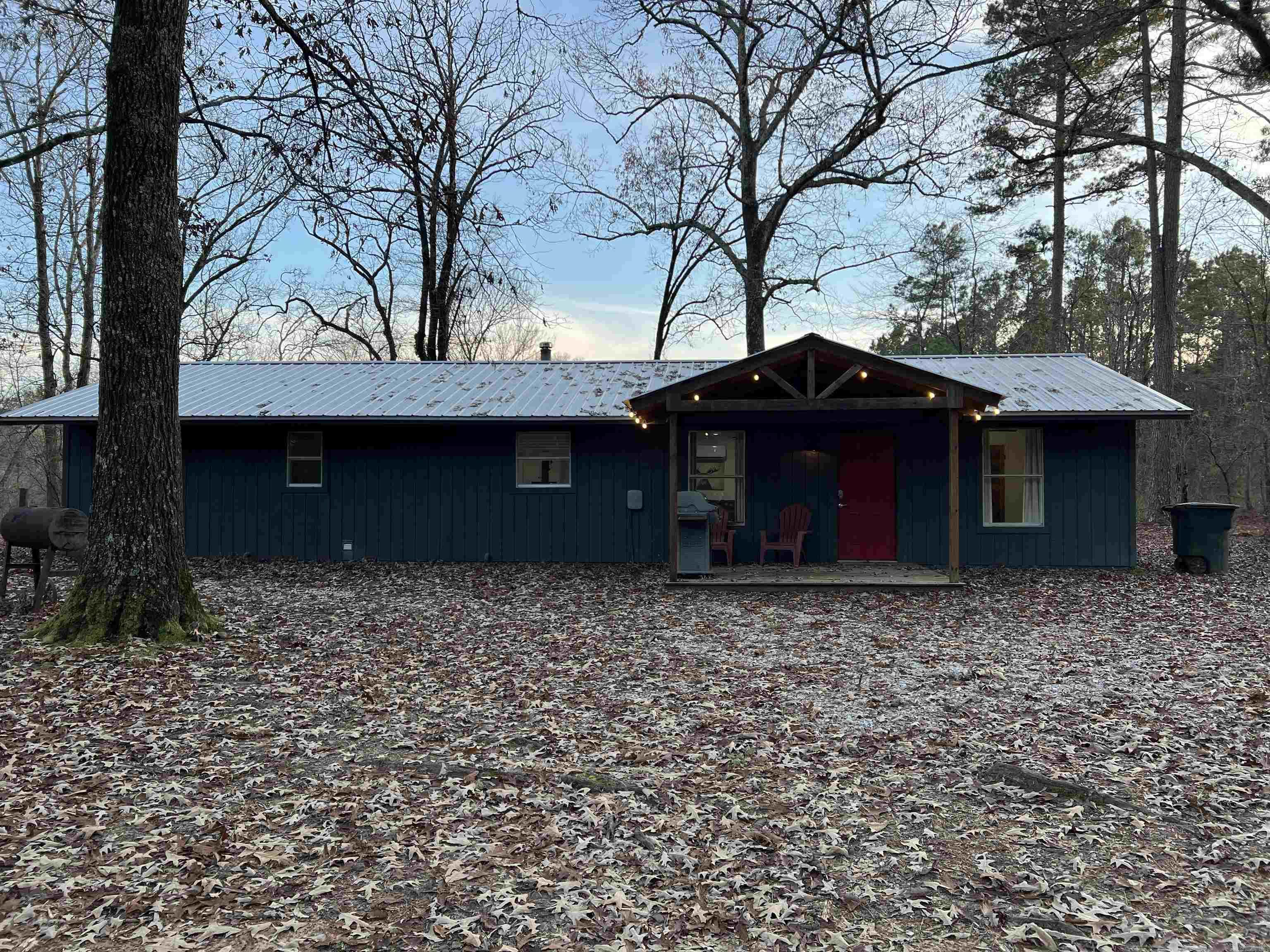 This beautifully remodeled 2 bedroom, 1 bath home sits on over 6.5 acres in the Bismarck School District. It features a cozy wood-burning stove, a new dishwasher, and an all electric set up. Currently used as a vacation rental, this home would also make a great family residence or long-term rental. With plenty of space and modern updates, it's perfect for those seeking a blend of comfort and rural living. Don't miss out on this charming property!