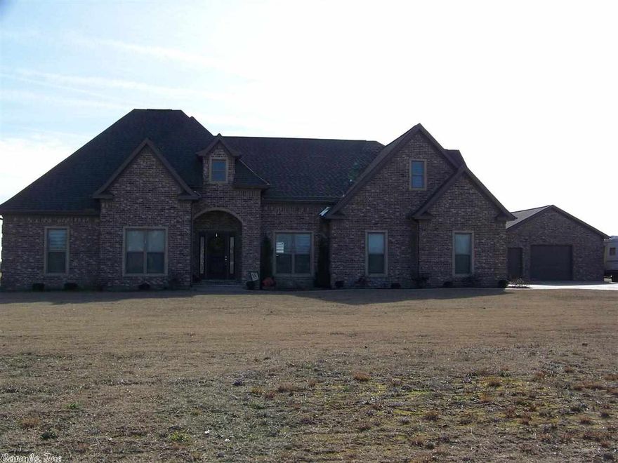 UPSTAIRS-DOWNSTAIRS-INSIDE-OUTSIDE! Everything you see will please you in this custom built home.  Bonus room upstairs w/1/2 bath could be 5th bedroom or kid’s playroom.  Eat in kitchen has lots of cabinets, granite counters tops & a pantry, separate dining room, large living room with WBFP and 9’ ceilings throughout.  In-ground pool, covered patio, 24x24 shop with electricity, and a 3 car garage sitting on 3 acres.