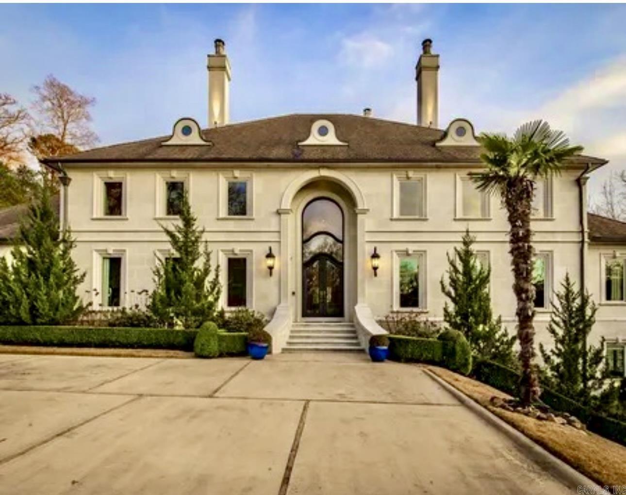 Live Like Royalty on the Lake! Welcome to Arkansas’ Ultimate Lakefront Masterpiece — a show-stopping, custom-built estate on 5.5 private acres with every luxury imaginable. From the gated entrance to 2 private boat docks, pool with waterfall & grotto, and an outdoor kitchen made for entertaining, this 4-story architectural dream will leave you breathless. Inside, it's an entertainer’s paradise with a home theater, indoor basketball court, arcade, sauna, safe room, wine cellar, and elevator connecting 5 stately ensuite bedrooms (6 full baths + 2 half baths!). Did we mention the tanning room, massage room, private gym, and chef’s kitchen loaded with high-end appliances? This is more than a home—it’s a private resort. Your dream life is waiting. Showings by appointment only—don’t miss your chance to own this one-of-a-kind treasure.