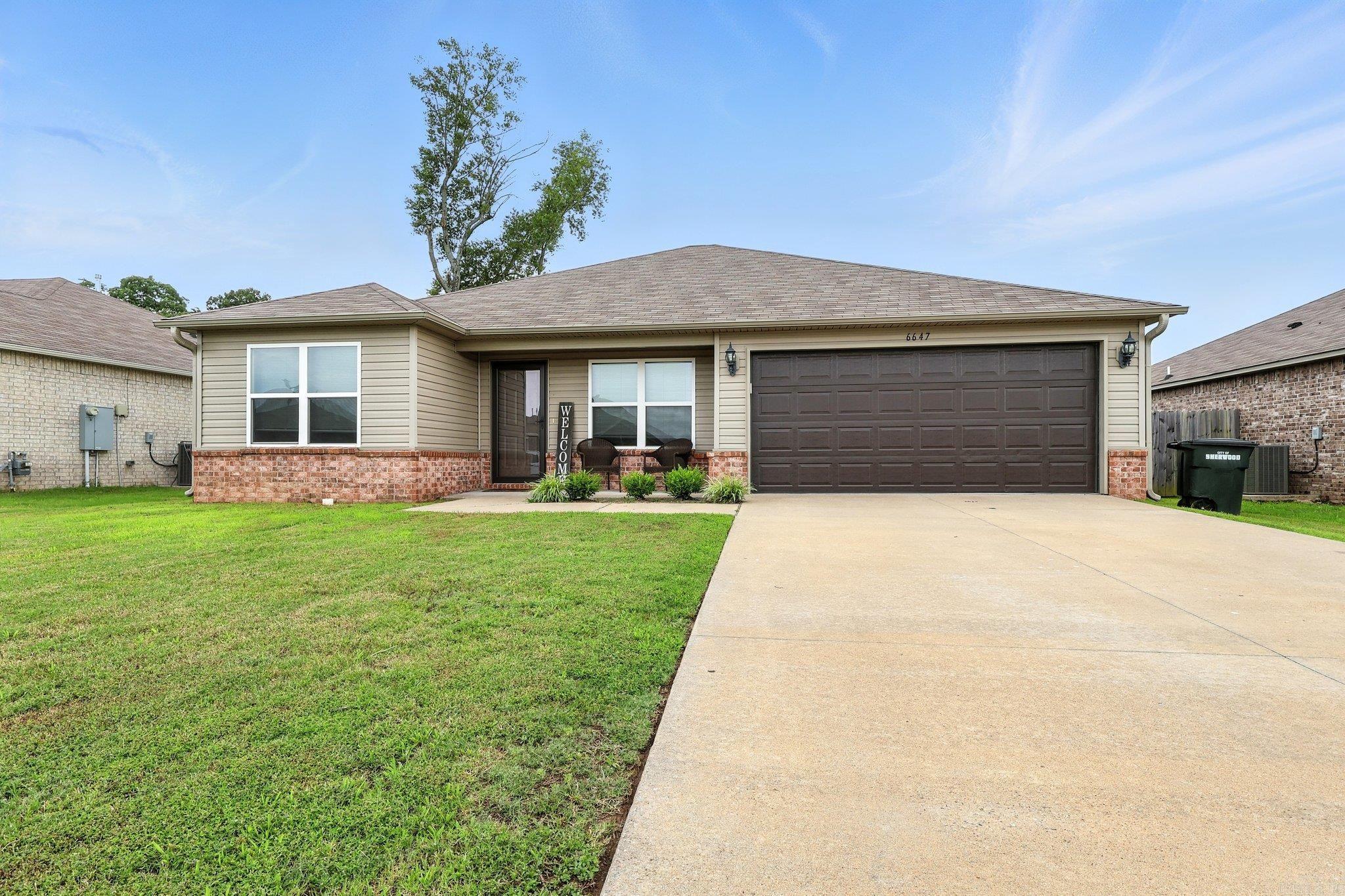 Located in the desirable Trammel Estates community in Sherwood, AR! This quaint 4-bedroom, 2-bathroom home features a thoughtfully designed split floor plan that seamlessly combines comfort and style, perfect for modern living. As you step inside, you'll be greeted by expansive living areas that are bathed in natural light, creating an inviting atmosphere for relaxation and entertainment. The kitchen is modern and functional, making it easy to cook meals and enjoy family dinners together, creating a warm and welcoming environment for spending time with loved ones. The master suite is a quiet spot where you can relax after a busy day. This home is located near a variety of family-friendly amenities. The area boasts several parks and recreational facilities, perfect for weekend outings and enjoying the outdoors with the kids. You'll find schools nearby, making the morning school run a breeze. For your shopping needs, there are a range of stores and supermarkets just a short drive away, and local dining options offer plenty of choices for family meals out. With easy access to community centers and libraries. SEE AGENT REMARKS