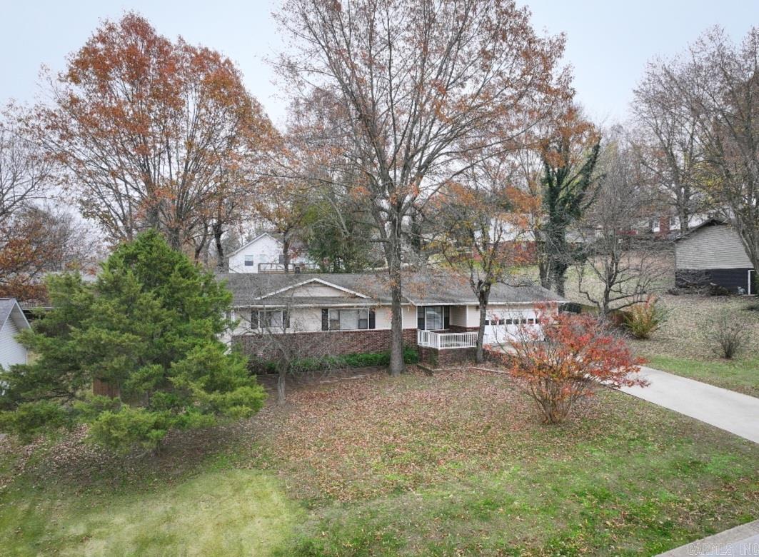 This property provides plenty of space to renovate and personalize to your style. This home features a flexible floor plan that can easily accommodate modern updates and improvements. With nice sized bedrooms and 2 full baths includes a large laundry room and an open kitchen/dining area. Enjoy the privacy of your fenced in backyard with covered back porch along with attached garage for parking or extra storage. It is in an excellent location with convenient access to local amenities. Come bring your vision to unlock its tremendous potential.