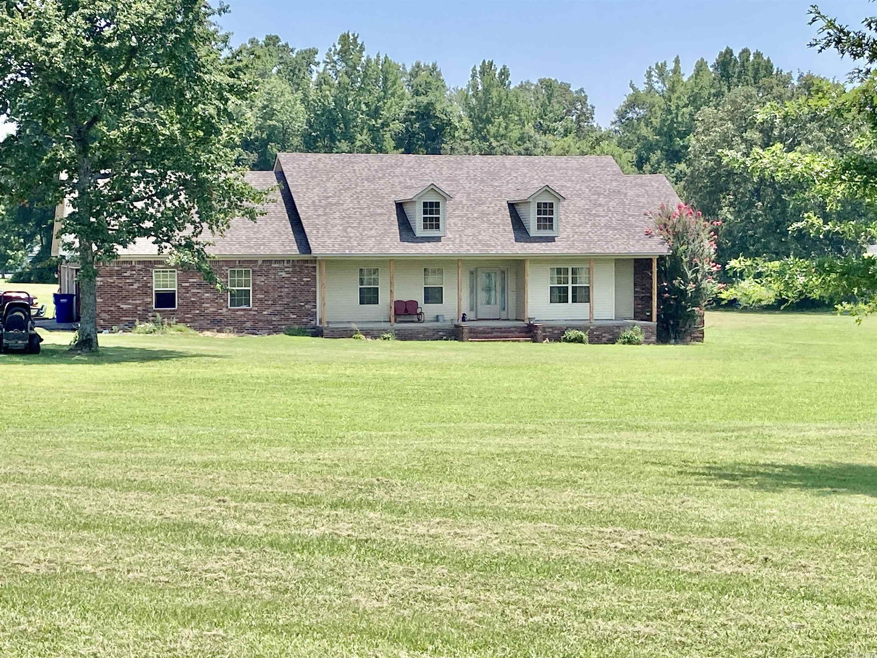 Located in the Greystone Subdivision in the Greenbrier School district. This 3 bedroom, 2 bath home with bonus room features approx. 2,059 SQFT of living space on a beautiful 2.87 acres. Enjoy the split floor plan, Great room concept with kitchen open to the living area, gas fireplace, breakfast bar, spacious cabinets, separate dining room, master suite includes large walk-in closet which doubles as a safe room, jetted tub and walk-in shower, refrigerator conveys, large back deck with fenced in yard, three car garage, floored attic. Updates include a newer hot water heater, new roof in 2019, and the heat and air units were just replaced in May of 2023.