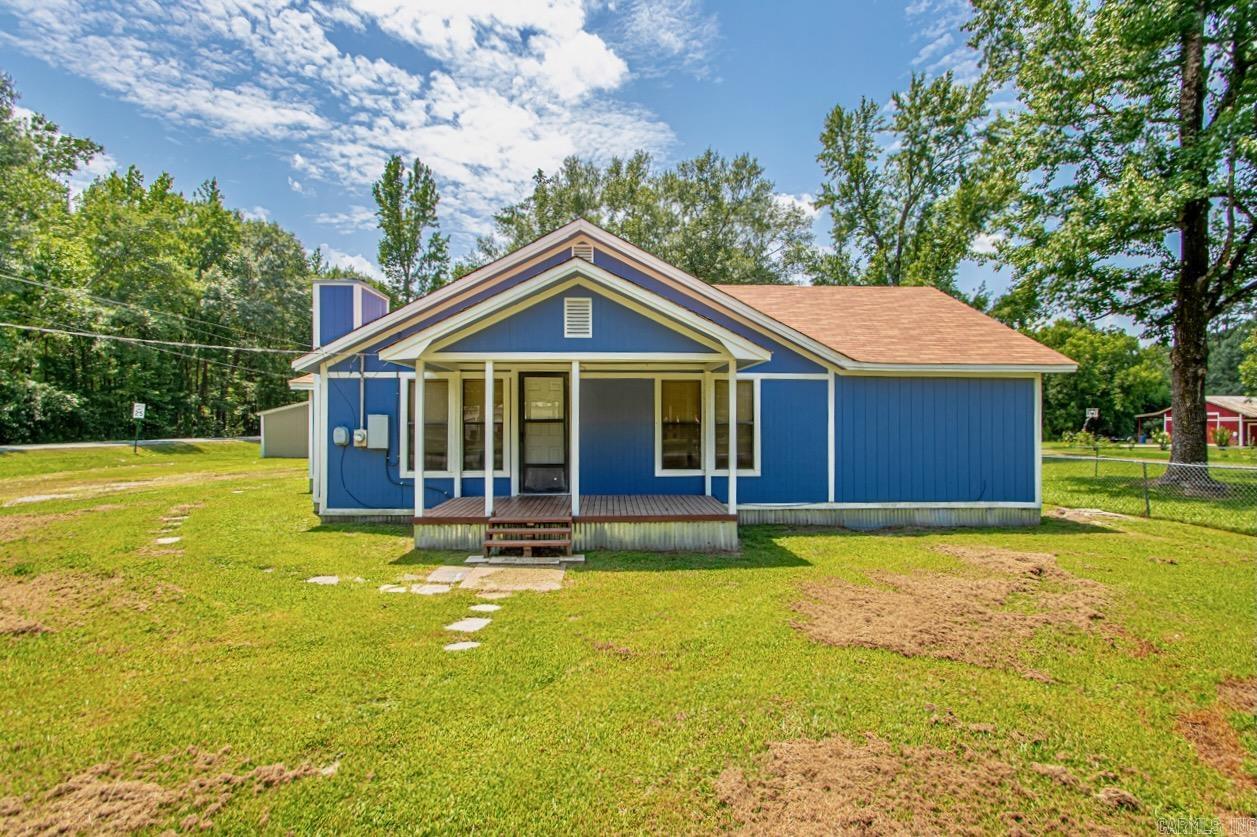 This 1950s charmer checks all the boxes. You’ve got 2 bedrooms, 2 full baths, and a flex room that can be whatever you need—home office, guest space, hobby room, you name it. And just imagine this: a chilly evening, your favorite book or movie, and the crackle of a wood-burning stove filling the space with that perfect cozy vibe. Step outside and there’s even more to love—a detached carport with a small shop, perfect for storage or weekend projects. The yard’s a great size, the front porch is made for morning coffee, and you’re less than 30 minutes from downtown Little Rock. Agents please see showing/agent remarks.