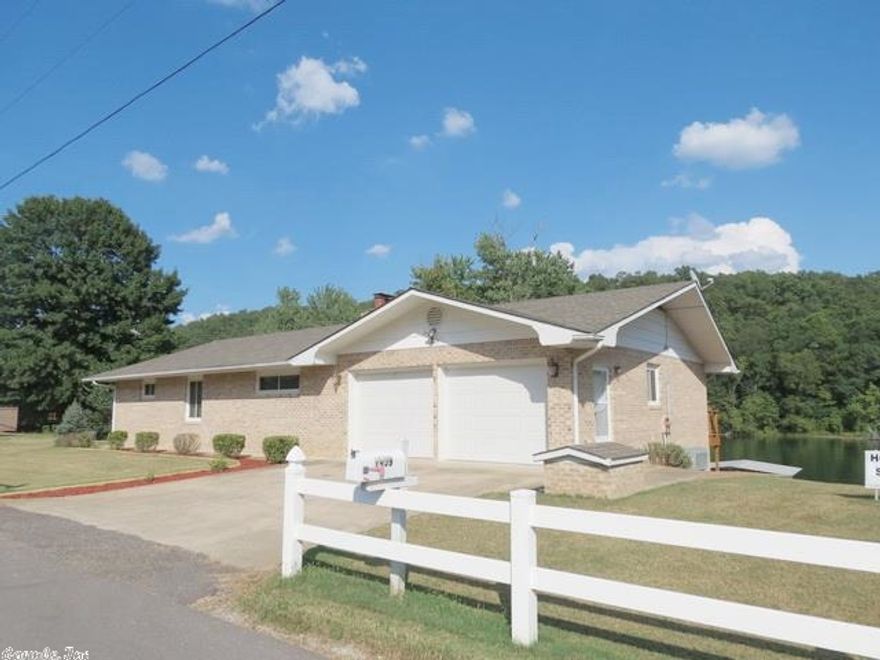 Outstanding view and access to the White River with your own maintenance free boat dock. Beautiful brick home with walkout basement. Home has not flooded. Long level lot in the front and slightly rolling in the back. Beautiful country and mountain views around. A must see.