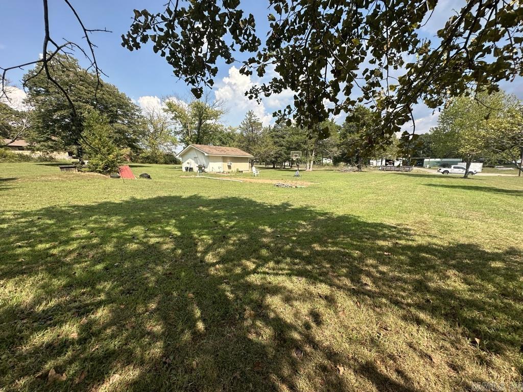 Come park your boat or RV on this beautiful 1.5-acre lot! Located just minutes from Greers Ferry Lake, this property offers endless possibilities. Enjoy a 14x20 shop with water and electricity, plus three RV hookups. Perfect for weekend getaways, camping, or a permanent hangout spot. With no restrictions, you have the freedom to make it whatever you want! Conveniently located less than a mile from Red River Dodge, this is the perfect blend of privacy and accessibility. Come check it out today!