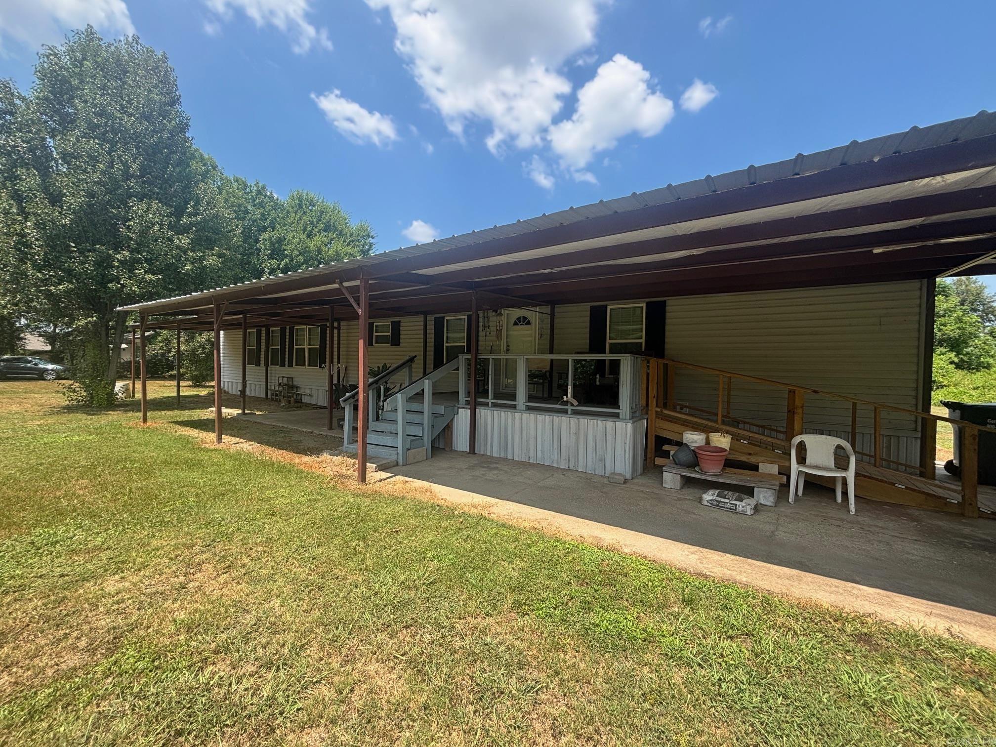 New Listing! MOVE-IN READY! This manufacture home is located on Lakehall Road with close proximity to the Chicot County Park boat ramp and less than five miles to the Greenville, MS River Bridge. This property features three bedrooms, two bathrooms, outbuildings, carports and a large front porch! Call the listing office to schedule a time to view this listing! 870-265-5664