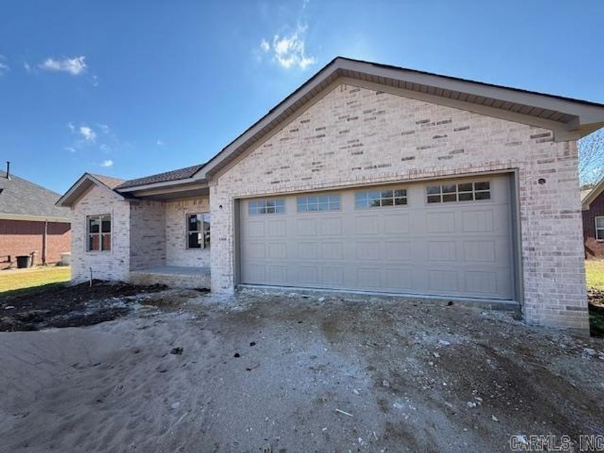 You absolutely will not find a more quiet spot with a brand new home! This home is now occupying one of the only lots left in the popular Wilhelmina Cove. The house backs up to a quiet creek where you will have the privacy behind you and the peacefulness that comes with it. Located at the end of a cul de sac for another bonus. This home will have LVP flooring throughout. Stained maple cabinets with beautiful granite tops in kitchen and bathrooms. A nice patio will be added under the covered porch. Gutters will be added as well. You won't want to miss out on this one!