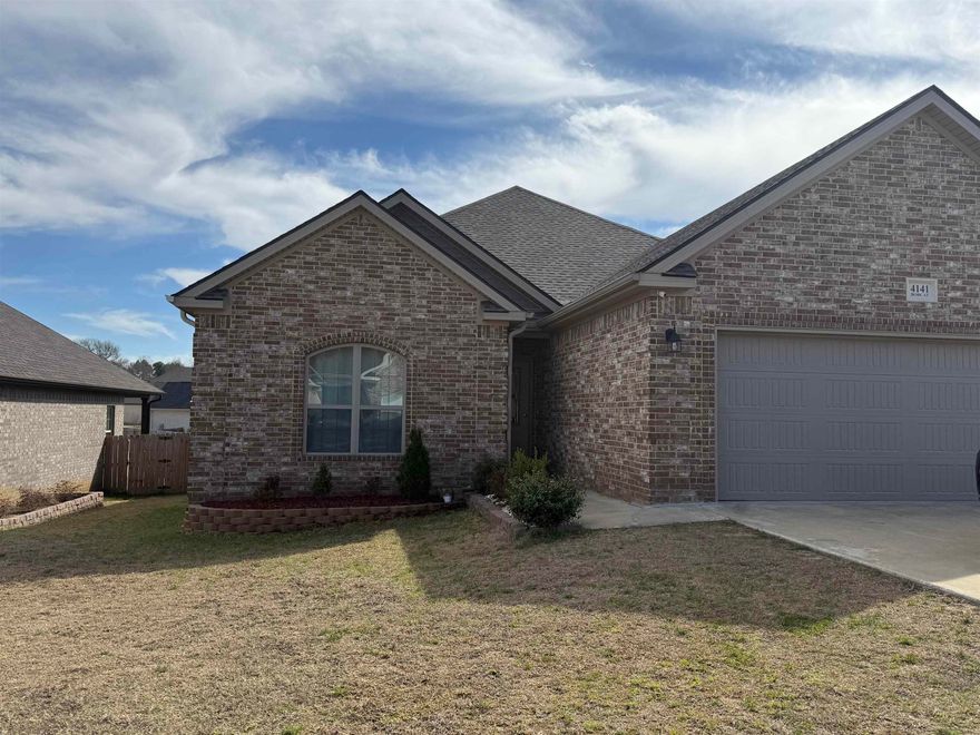 All brick, 3 bedroom, 2 bathroom home with featuring plank tile flooring throughout the main living areas. Granite countertops in the kitchen and the bathrooms with white cabinets. Call your favorite realtor to check it out!