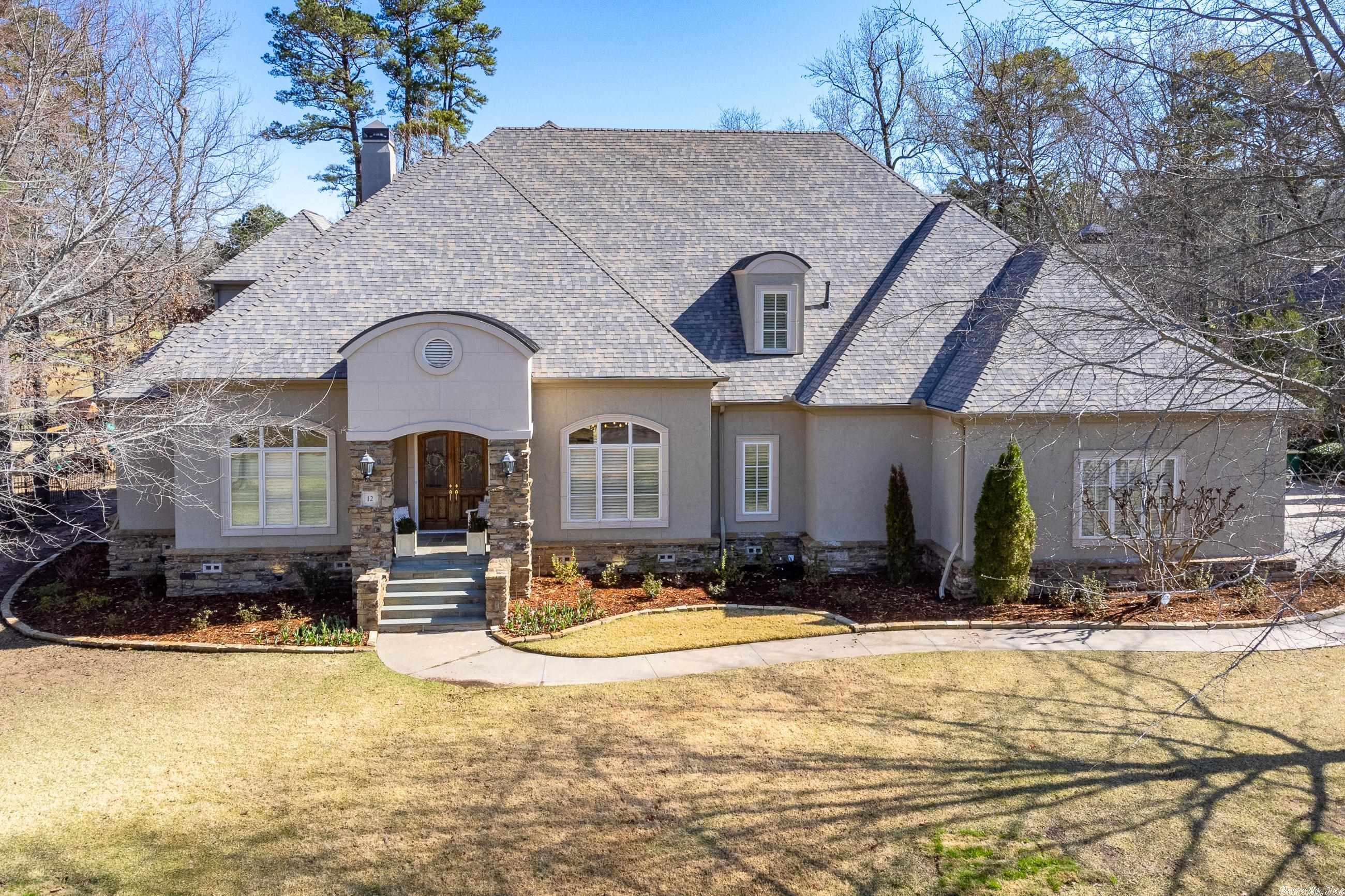Spectacular Golf Course home in Bretagne. Beautiful inside and out! Numerous updates w/ Gorgeous fresh décor and exceptional family floor plan. Handsome entry, large family living with fireplace and open formal dining. Wonderful kitchen and breakfast area with exceptional views adjacent large Den. Fabulous master suite with sitting room and luxurious spa inspired bath. Upstairs playrm w/ three large bedrooms and two full baths. Wonderful terrace overlooking landscaped grounds and golf course. 3 car garage.