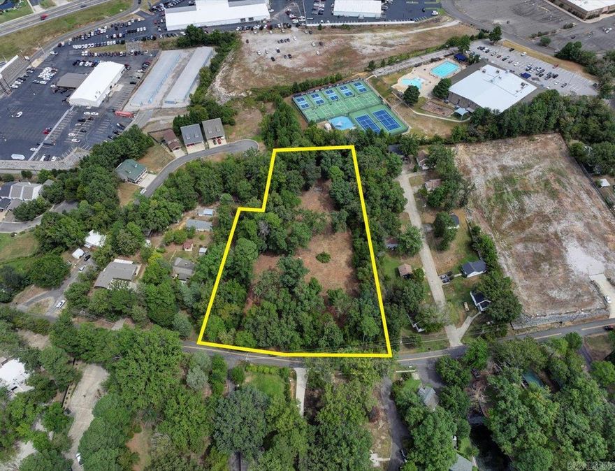 **2+ Acre Lot with Stunning Lake Hamilton Views!** Build your dream home on this beautiful 2+ acre lot offering breathtaking views of Lake Hamilton. The property features rolling hills, mature trees, and a cleared area, providing the perfect blend of natural beauty and privacy. Centrally located, you'll be just minutes from shopping, restaurants, and all the amenities you need. With utilities available at the road, this lot is ready for you to bring your vision to life. It's a wonderful opportunity to create your ideal living space in an excellent location!  Agents - Call Showing service to schedule all showings.