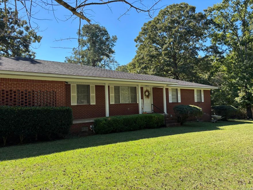 Charming 3BR/2BA brick home with updates throughout! This attractive home features an open floor plan & numerous recent upgrades including newer appliances with disposal, fresh paint, new flooring, light fixtures, ceiling fans, & blinds in most rooms. Bathrooms have been refreshed with new sinks, commodes, & a new walk-in shower in the hall bath. Enjoy meals at the breakfast bar or unwind in the glassed-in sunporch overlooking the well-maintained yard & a new storage building. A rear deck adds the perfect touch for outdoor relaxation. Move-in ready & beautifully updated – come see all this home has to offer! *Seller is not leaving generator.*