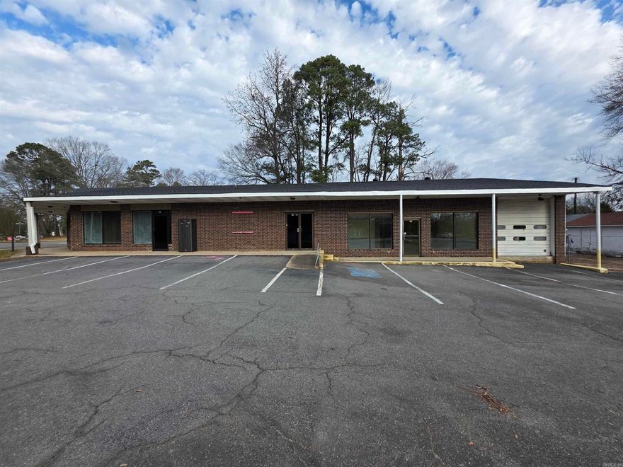 ATTENTION INVESTORS! This commercial property features three commercial  spaces plus a 2 bedroom, 2 bath private residence making it unique as an investment opportunity!  All commercial units have a foyer/reception area and one unit features an office type setup.  The other two have large open concept areas perfect for storage or showroom options.  The roof is new in 2025!  Sheridan is a growing community with a small town environment and has such a welcoming feel. The residential unit is currently rented with a longer term tenant on a month to month lease.  There is so much room for income potential with this great listing.