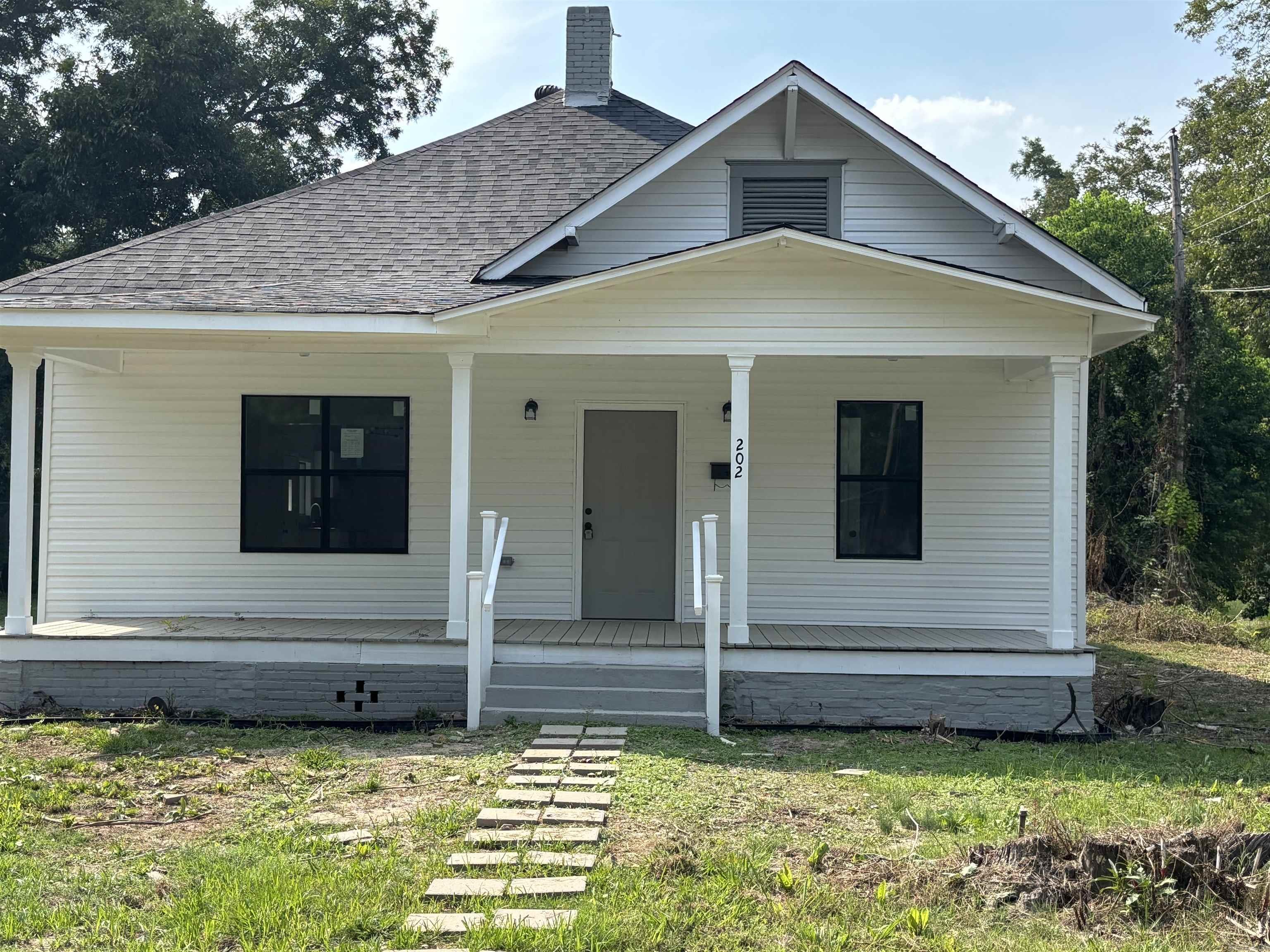 Total renovation located in the heart of Lonoke. This wonderful home has all new windows, new flooring, lighting, plumbing, electric, roof, AC, paint inside and out, new kitchen, gravel in driveway and everything has been approved by the city inspectors. All of the work has been done for your family. It is move-in ready! The spacious rooms, tall ceilings and open floorplan with light gray and white tones looks amazing! There has been a lot of love poured into this historic home. Kids can walk to all schools! Call today for your private tour!