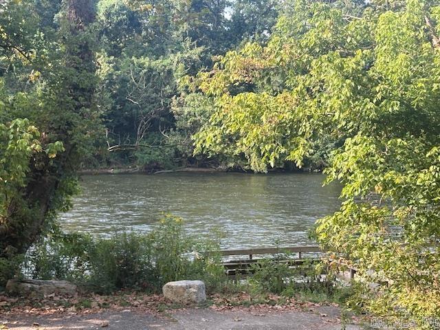 1.68-acre Norfork River lot. In town and outside a flood zone. Rare opportunity to own 1.65 acres overlooking beautiful Norfork River. Enjoy the river views and access without the worry or flooding. Prime location just inside city limits of Norfork. River access less than a mile away for fishing, kayaking or relaxing by the water. Build your dream home or getaway retreat. Whether you are looking for a private escape, a full-time residence, or an investment in one of Arkansasā most scenic river towns, this property has it all.