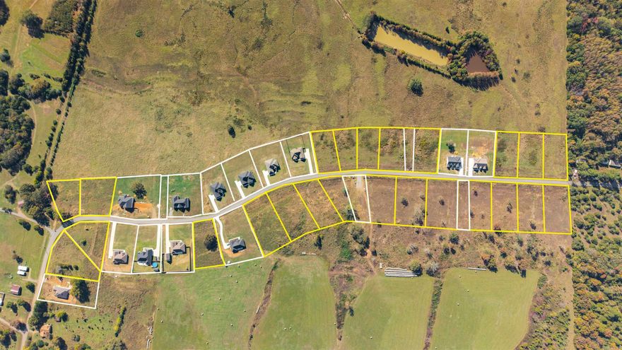 Looking for a place to build your home! You will love this spot with a view! These cleared lots have public water at the road. They will be on the Greenbrier sewer system. 2000 sq. ft. minimum. Any builder welcome.