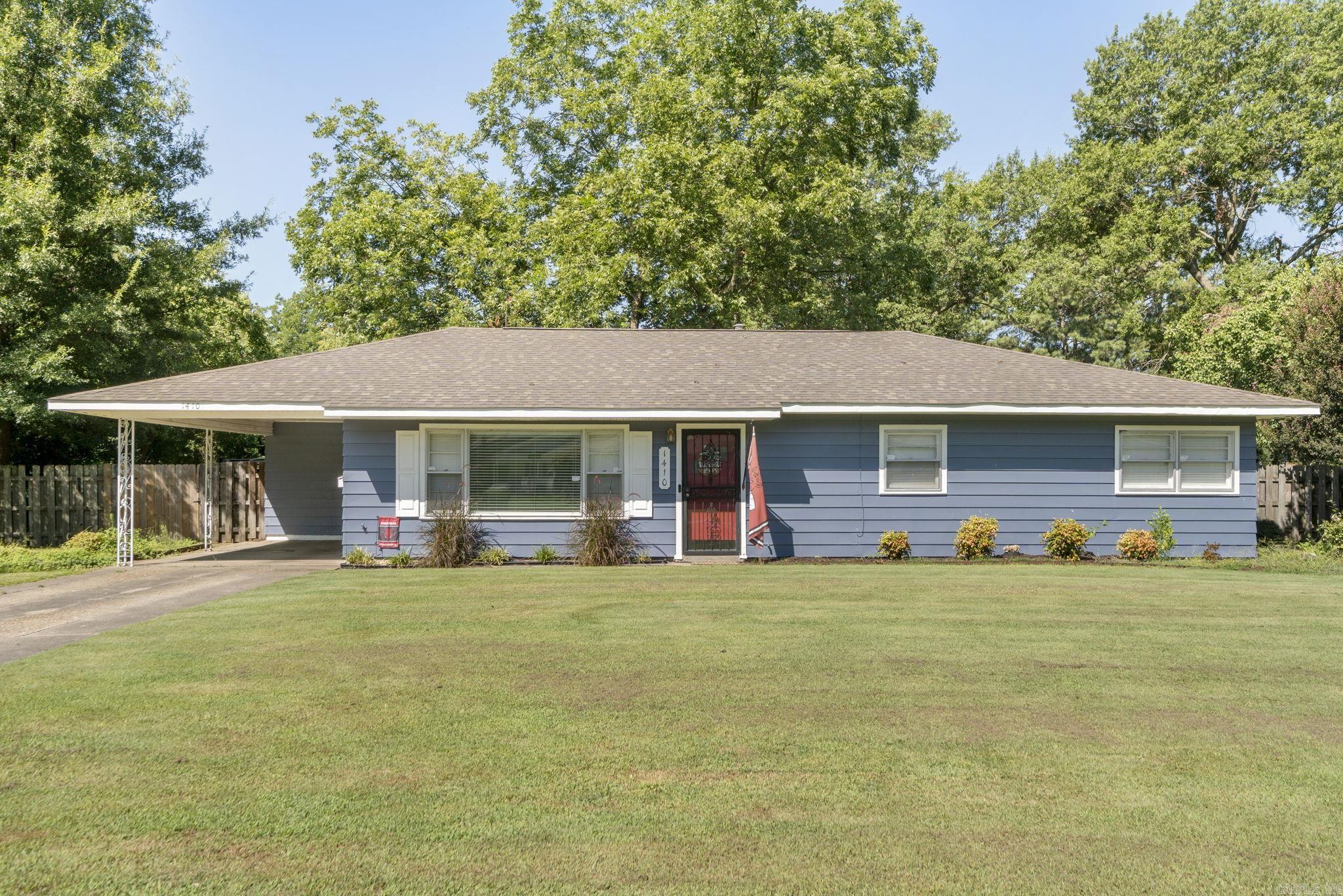 Check out this beautifully updated 3 bed, 2 bath home tucked away on a quiet, wide street! With fresh paint, new flooring, stylish new fixtures, and a completely remodeled kitchen (dimmable lighting), this home is move-in ready. The black refrigerator will convey with the sale, as well as the custom shelf unit in the utility room. New roof in 2023 and new HVAC in 2024. Outside, you'll find a fully fenced yard and a second driveway located at the back of the property for added convenience. Cushions for swing convey. The detached shop is already plumbed, brand-new window unit A/C purchased and will convey. Please note: showings require 24-hour notice. A perfect combination of updates, space, and practicalityādon't miss this one!