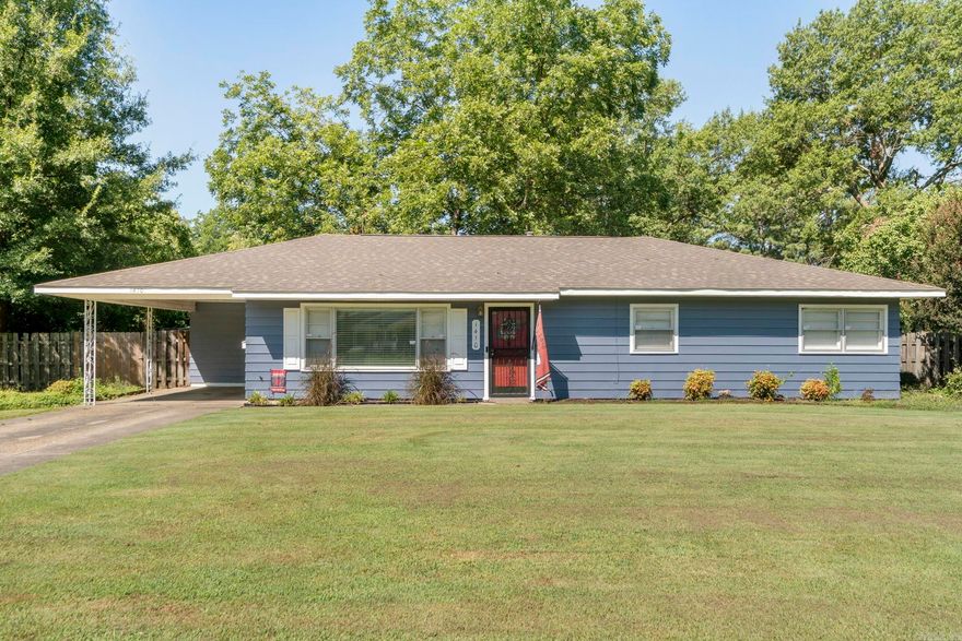 Check out this beautifully updated 3 bed, 2 bath home tucked away on a quiet, wide street! With fresh paint, new flooring, stylish new fixtures, and a completely remodeled kitchen (dimmable lighting), this home is move-in ready. The black refrigerator will convey with the sale, as well as the custom shelf unit in the utility room. New roof in 2023 and new HVAC in 2024. Outside, you'll find a fully fenced yard and a second driveway located at the back of the property for added convenience. Cushions for swing convey. The detached shop is already plumbed, brand-new window unit A/C purchased and will convey. Please note: showings require 24-hour notice. A perfect combination of updates, space, and practicality—don't miss this one!