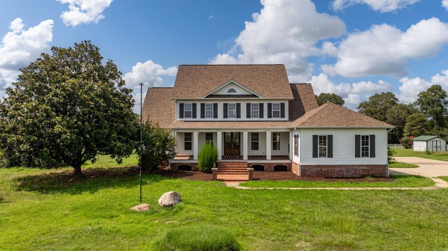 Nestled on 10 acres, this home is an incredible blend of luxury and country living!  Completely renovated in 2021, it is perfection from top to bottom and packed with charm!  Custom double doors open to a bright oversized entry flanked by a formal dining room and study. Walk in to the cozy den, high ceilings and floor-to-ceiling windows.  The chef's kitchen is to die-for! Quartz countertops with a kitchen island and all luxury stainless steel appliances, it is perfect for entertaining.  Precious breakfast nook that opens to a spectacular 640 square foot covered deck.  Primary en suite bedroom down with a spa-inspired bathroom.  Soaking tub, double vanity, and walk-in shower.  4 bedrooms up.  This would make an amazing equestrian property, with a 50x50 barn on the acreage.  All utilities underground, including natural gas & fiber internet.  Come see today! Agents, see remarks.