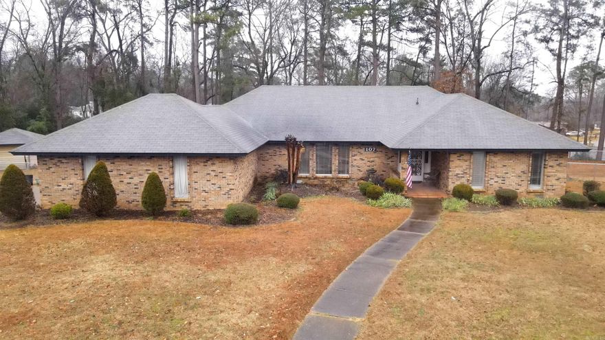 MOTIVATED SELLERS! Beautiful Home with 2 Spacious Family Rooms, one including a fireplace, built in bookcase and antique stain glassed window. 3 Bedrooms with Large Closets. Home has a brand new chain link fence of the entire back yard. Newer Heat and Air. Brand New Hot Water Heater, Luxury Vinyl Flooring in the Den/Family, Kitchen and Dining/Family rooms, Fresh Paint and New Light Fixtures. This homes sits on a large lot with a storage unit, RV shed and TREX back deck that is dreamy. Other great features include Professional Landscaping with flowering trees and perennial flower beds with sprinkler system. Large windows to allow natural light and several pocket doors to keep in or close off spaces for kids or pets. Come take a look and make this Your FOREVER Home!