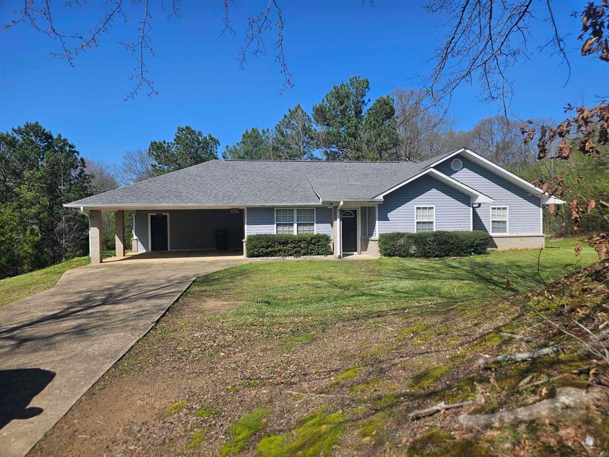 City Living with Rural feeling.  3BR, 2BA Features: Large Spacious Kitchen area, with tons of counter space and cabinets.  Bedrooms are spacious and Primary Bedroom large closet space and private bathroom.  Covered parking and storage/storm room.  Home sits on 0.70 acres.