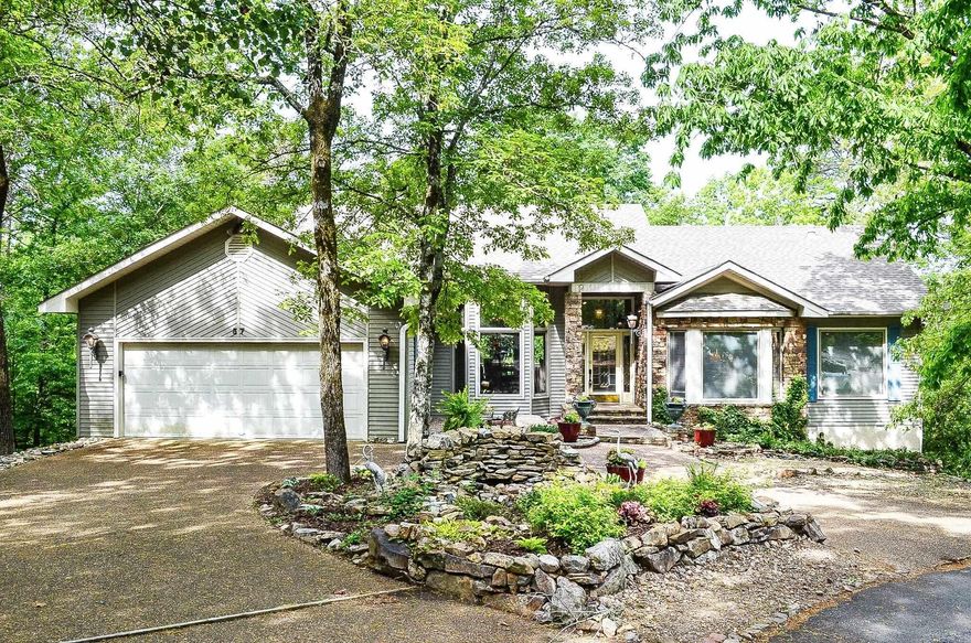 AGENTS SEE REMARKS!! Room for everybody and everything!! This beautiful home is like having two houses for the price of one. Two bedrooms on the main level including two full baths, powder room, living, dining, eat-in kitchen, laundry, den and office. Downstairs is another living-dining area with kitchenette, 3 more bedrooms and 2 full baths. Perfect for mother-in- law apartment, bunkhouse for the grandkids, live in help or other family members. There is .75 acres of common property behind that leads down to Lake Coronado, which gives you a fabulous view or easy trip to put your kayak in. Centrally located with easy access to the Glazy Peau, West and East Gates. ROOF 2026 Don't let this one get away!!!!!!