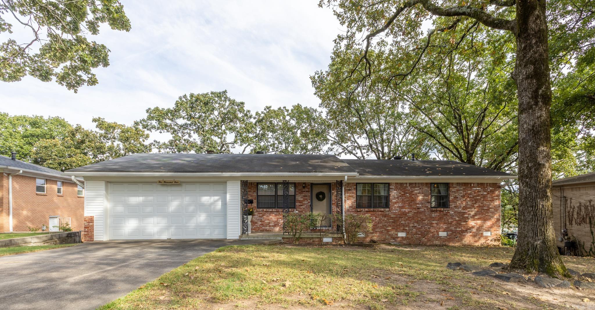 This charming 4 bedroom, 2.5 bath home within minutes to the freeway is up for grabs!  Original hardwoods believed to be under the carpet (visible in primary closet). New HVAC system & furnace in 2023.  New carpet, sink, cabinets & countertop downstairs! And to top it all off, seller installed additional driveway in back of home with bonus 16x24 shop (has garage door to fit additional vehicle/toy) & 10x24 additional loft overhead.  This is your chance to get into a great-sized home and make it all your own for an amazing price!