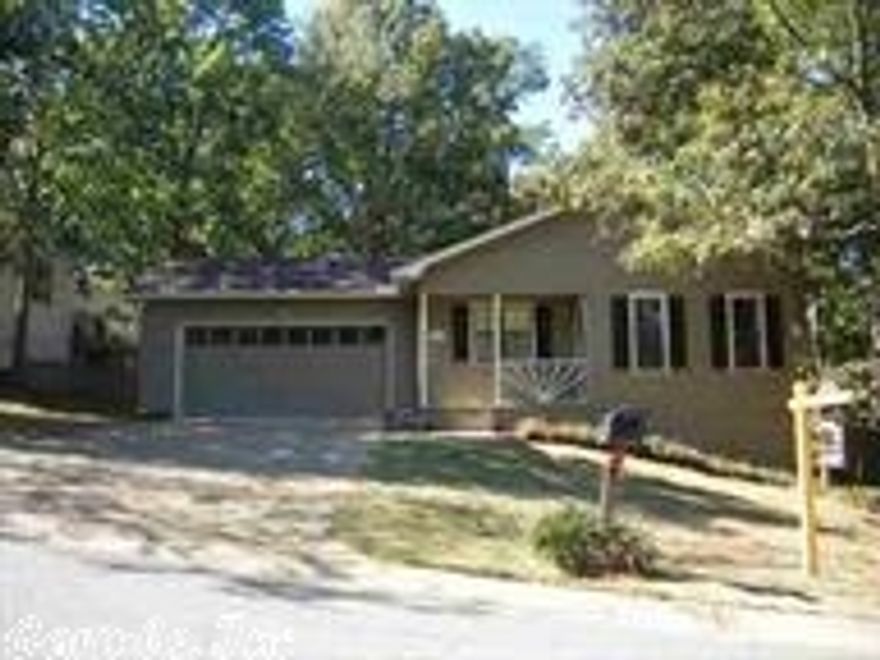 Awsome, move-in ready, 2 br, 2 b home.  Lg. greatroom w/fireplace.  Lg. kitchen with glass front cabinets. Plantation shutters.  All S.S. appliances convey.  Large breakfast room with breakfast bar. Laundry room.  Two car garage w/new garage door, new deck, new fence, and freshly painted exterior. Security system.   Great neighborhood.  Close to everything.