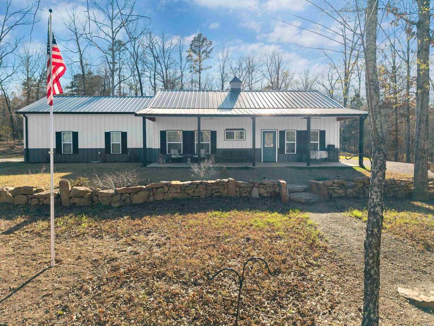 Tucked away on 12.08 unrestricted acres, this newer construction home offers privacy, quality construction, and custom finishes throughout. The 1,200 sq/ft home features 2 bedrooms and 2 bathrooms, with beautiful ponderosa pine interior walls and vaulted ceilings in the main rooms combined with 10' ceilings in the bedrooms giving the space a warm, open feel. Built with 6" exterior walls and spray foam insulation (kept off the exterior metal for easier maintenance), the home is designed for efficiency and durability. The water heater is a heat pump hybrid and is 3-4 times more efficient than a standard electric water heater.  The hall bathroom includes a relaxing jacuzzi tub, and the refrigerator, washer, and dryer all convey with the home. About ¾ of the property is fenced, and the land is filled with abundant wildlife while still offering a very private setting.  A major bonus is the separate RV pad set up for two RVs, complete with its own septic system, water, and an RV electrical pedestal with 50, 30, and 110 hookups. Sellers also installed a 100-amp electrical box on the north side of the home, ready for a future pool or hot tub.  Fiber internet is available here as well!