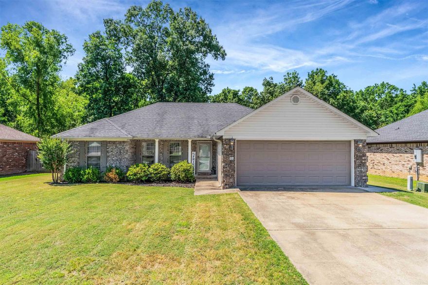 Welcome to this charming home nestled in between Conway and Vilonia - Vilonia School District. Featuring 3 spacious bedrooms and 2 full bathrooms, this property offers a split floor plan perfect for both privacy and functionality. This home includes arched doorways, tray ceilings, stainless steel appliances and a cozy gas fireplace in the living room. The master bedroom includes his and her closets, a soaking tub and a walk -in shower. Step outside to enjoy the covered, screened in patio ready for entertaining or relaxation and the fully fenced backyard that backs up to green space. Don't miss the opportunity to make this home yours!