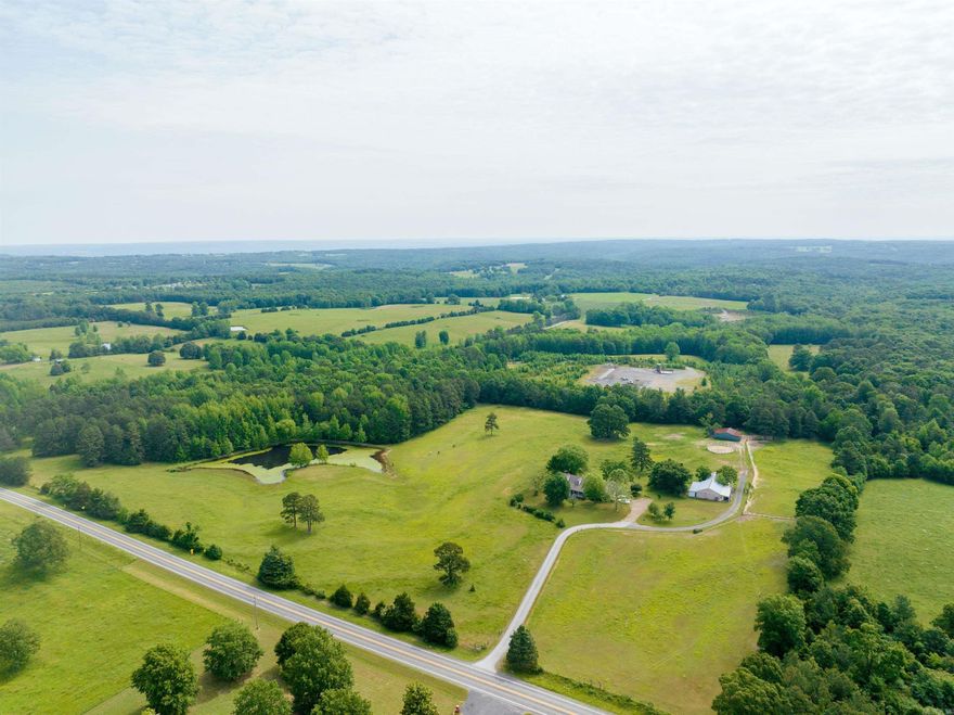 CUSTOM BUILT HOME WITH 30+/- ACRES!!! Bring your family and enjoy the view and the fresh air of this beautiful property! This is a must see with all of the right touches. Beautiful land with a large pond for your horses or cows, whatever your preference. There is also a 30 X 50 Shop and a 20 X 32 Pole Shed. Property is fenced and cross fenced. The home is custom built with a large living area and wood burning fireplace. The kitchen features granite counters and custom built cabinets.  Apart from the kitchen cabinets there is a walk-in Pantry. You will also love the oversized laundry room with extra space for sewing or whatever your hobby may be.  Storm Shelter in the backyard! Call today to schedule an appointment!