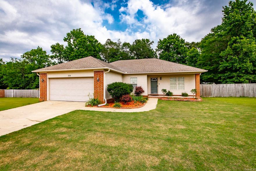 Discover your peaceful retreat in Lonoke County, located in the highly sought-after Cabot School District! This charming 3-bedroom, 2-bath home offers the perfect blend of country living and town convenience. Situated on a spacious 0.86-acre lot, you'll love the expansive fenced backyard and the inviting deck, ideal for relaxation or entertaining. Enjoy picturesque views of the pond directly behind the property, enhancing that serene, country feel. Inside, the home has been enhanced with new paint in various areas, ready for you to move right in. For your safety and peace of mind, there's also a convenient in-ground storm shelter located in the garage.  Ready to make this peaceful country home yours? Contact us today to learn more or schedule a viewing!    SqFt approx measuring encouraged,  (see agent remarks)
