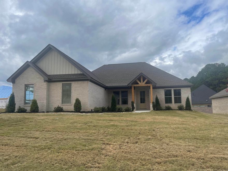 This home sits on corner lot, side loading garage. Covered front porch with cedar post. Home has LVP flooring, Has large kitchen, with island, walk in pantry. Great room has fireplace over looking kitchen. Has powder room. Covered back porch. Master has custom ceiling, tile shower free standing bath. Buyer can join Silver Springs Country Club, has golf, pickleball