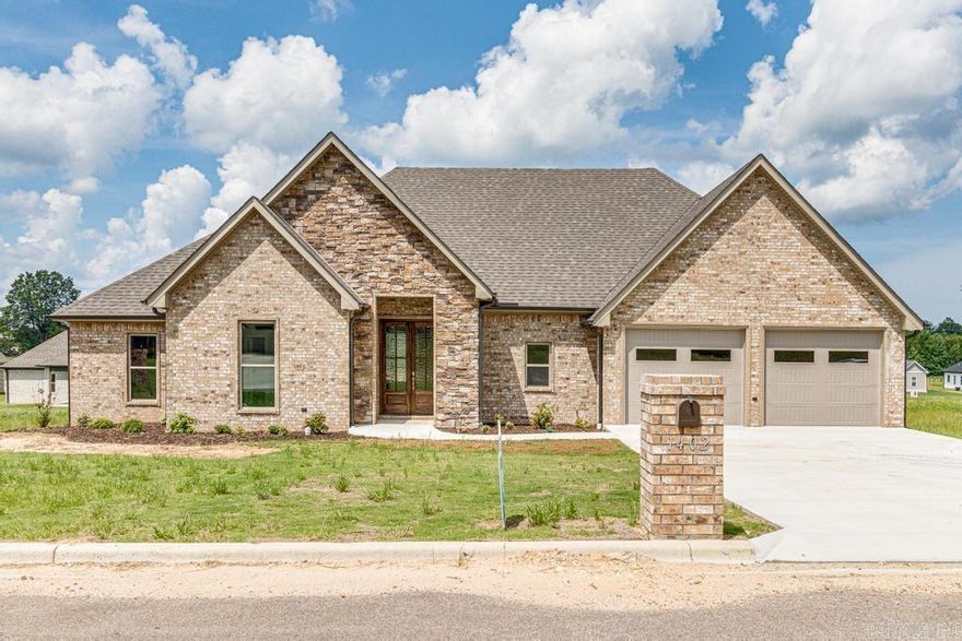 Listen, If you want a well thought out floor plan this is it! Picture this...You get home from the grocery store, pull in the garage and unload the groceries straight into the pantry?! YES! This 4 bedroom 2.5 all brick new construction home has a unique floor plan that has an entry from the garage straight to the pantry! You also have another entryway into the home as well through the garage that leads into a foyer with a mud room area! Split floorplan with master suite well equipped with large closet leading into the master bathroom, separate vanities, tile shower and soaker tub. 3 guest bedrooms and a large guest bathroom! Beautiful fireplace in the open concept Living,Kitchen area. Spacious pantry! Dining space and breakfast bar! Covered porch with a huge deck!!! Fenced in Backayrd!! So many great features in this one!