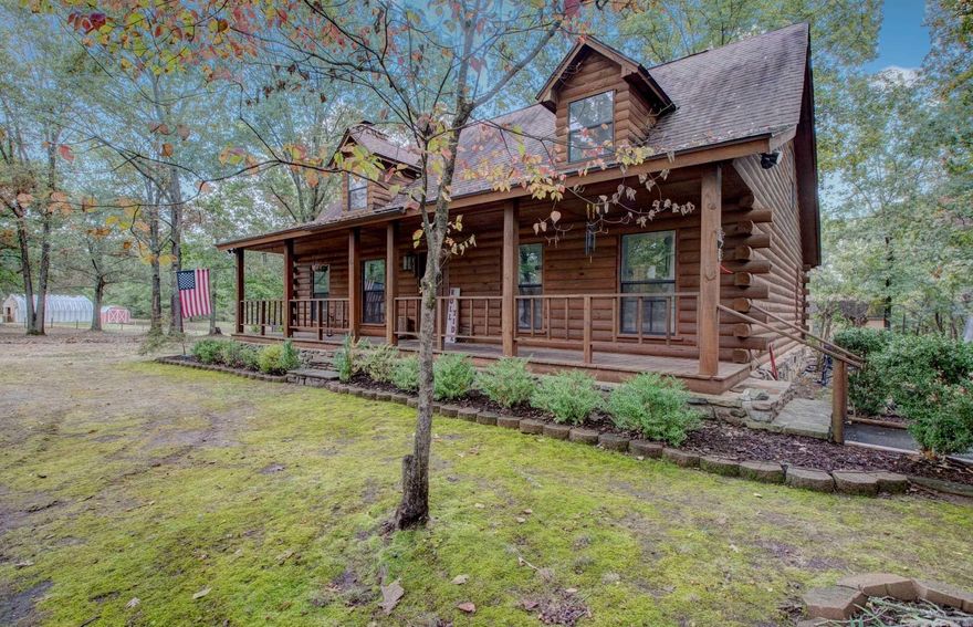 Introducing, this incredible property in the heart of the Bauxite area, offering 5.65 acres of Endless possibilities. This Gorgeous log cabin style home offers 3 bedrooms, 2 full baths as well as a "bonus" space perfect for entertaining, Kids game room or whatever the mind can imagine. This beauty has gorgeous open space vibes for comfortable living and entertaining. The large front porch is perfect for morning coffee and nature watching as you relax and unwind in the evenings. The open floor plan makes entertaining a blast with its open kitchen/den concept. Its magnificent rock fireplace is welcoming for those cold winter days and cozying up by a crackling fire.  With a beautiful spread of trees, a pond and all the possibilities one can imagine, as well as being in the middle of the sought out Bauxite school district, this is a must see opportunity. Don' forget the detached green house or extra storage space (electric and Heated and cooled) in back of home as added cherry on top! Schedule your appointment Now, don't miss out on this one!!