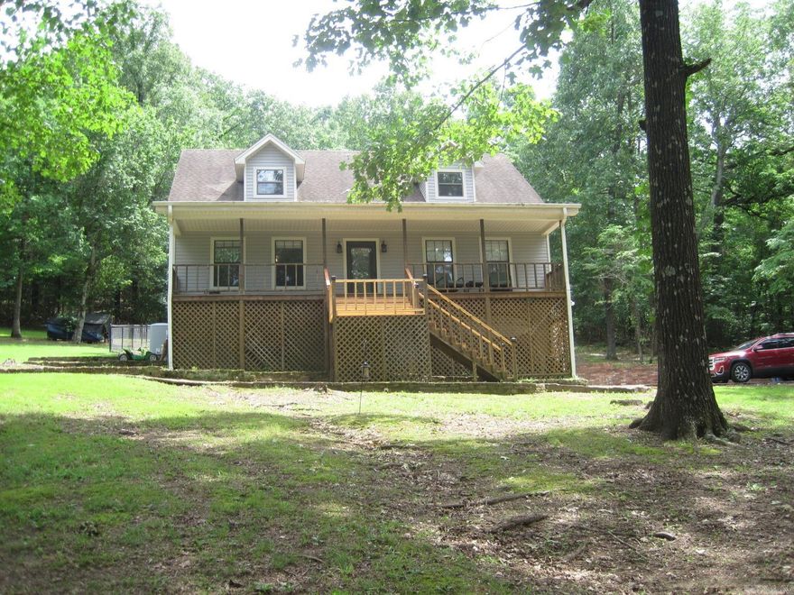 So many updated features... New siding... New deck... New carpet... New master bath... New countertops... New paint... all this on three beautiful acres... minutes from Russellville shopping. Also has a detached 26 x 26 shop... climate controlled... it can be anything you need it to be! Better hurry... this won't be here long!