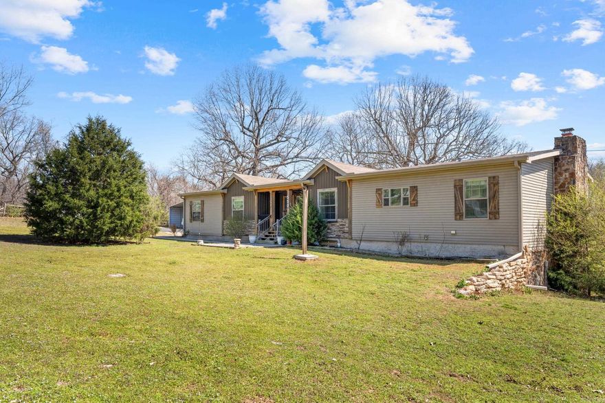 This spacious 2,340 sq ft home sits on approximately 2.41 acres and offers the perfect mix of country living and convenience to town. Featuring 4 bedrooms and 2 full baths, the home includes a welcoming beamed entry, designer kitchen with built-in coffee bar, and a comfortable floor plan with a large walk-in closet in the primary suite. A full basement with its own outside entrance provides great space for a workshop, hobbies, or future living area. Outside you’ll find a carport and a roomy barn-style shop for equipment or recreational toys. With a newer HVAC system and easy access to shopping, schools, medical facilities, lakes, and outdoor recreation, this property offers space, comfort, and a great location.