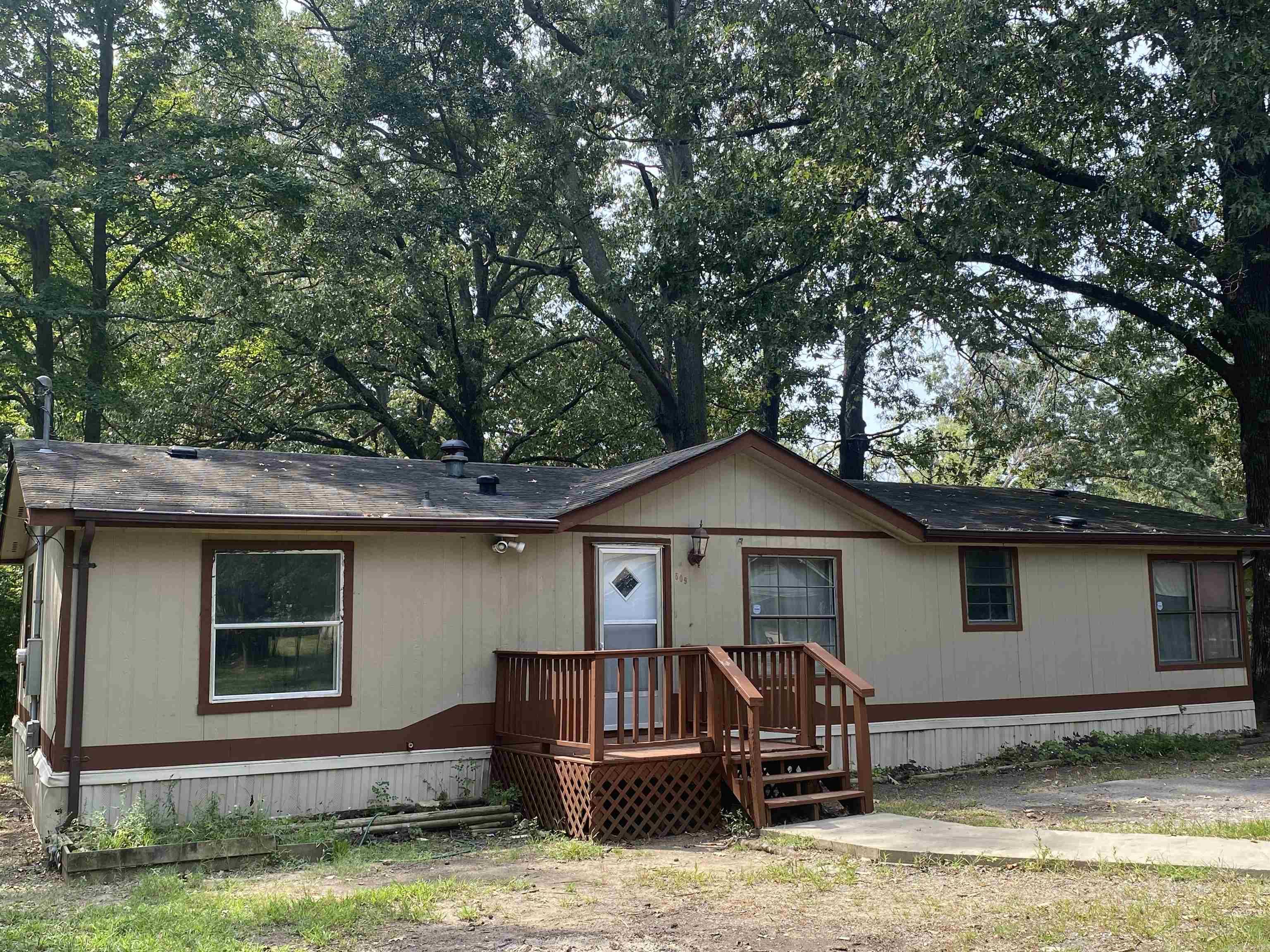 Own cheaper than renting! Located in town near schools. Split floor plan. Good size primary bedroom. Primary bathroom features a garden tub and separate shower. Large den. Kitchen with lots of storage space. There's a breakfast area and a separate dining room that can be used as an office. New pex plumbing installed approx 2 years ago. Give it a little love and make it yours. **see agent remarks**