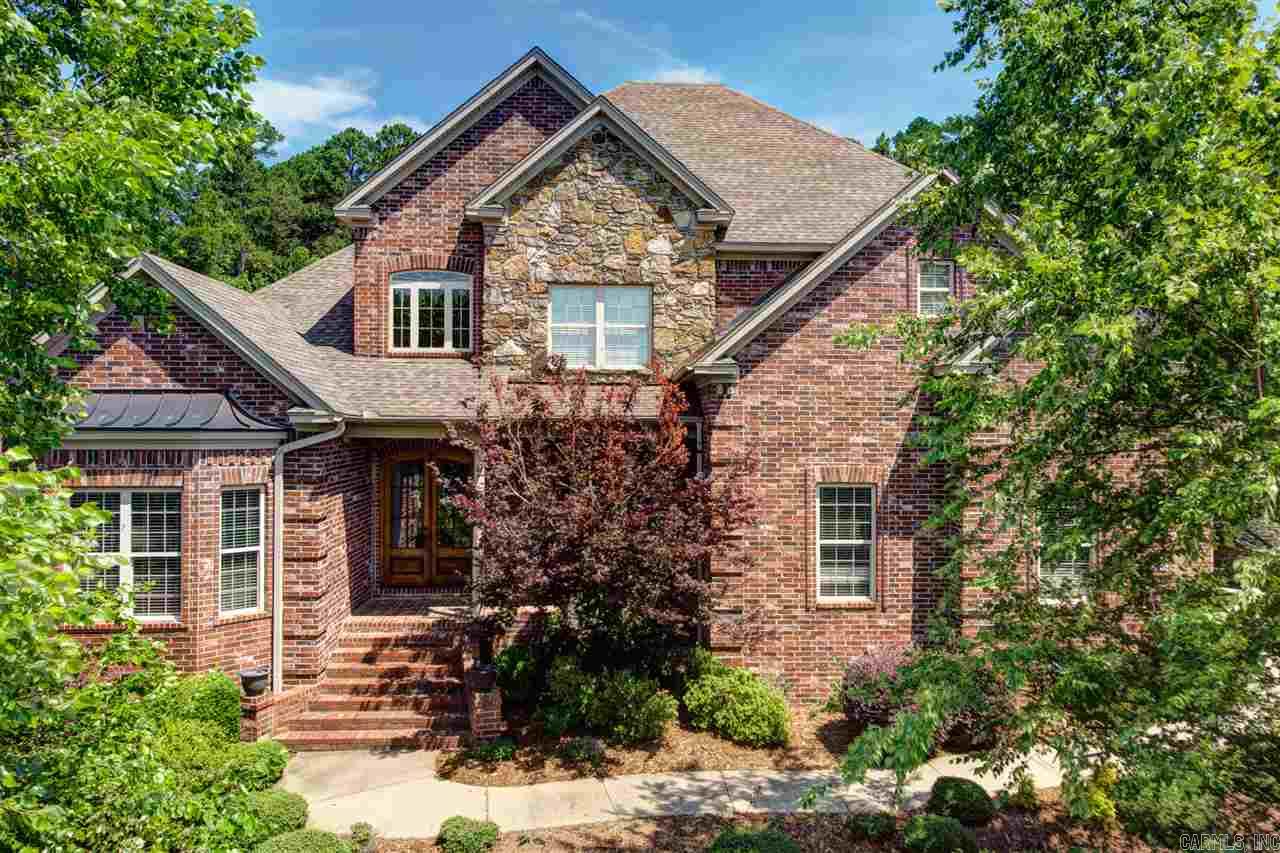 Amazing private backyard retreat! Outdoor living at its finest. Huge covered patio, salt water pool, gazebo w/WBFP, TV, heaters & backs to green space! Versatile & open floorplan. Chef's kitchen w/granite, oversize island, 5 burner gas cooktop, double oven & cozy hearth room w/gas FP. 2 BRs up, 2 down. 1st floor master w/sit area. Hardwoods in office, living & dining rooms. Large laundry, media w/wet bar, exercise & craft rooms. Mudroom off 3 car garage w/addl storage. Entertainers dream on quiet cul-de-sac