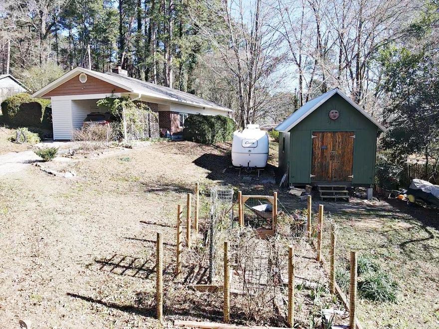 This beautiful home has lots of character and charm and is waiting for its new owners.  Sitting on a hillside very close to the Ouachita Baptist University campus, this home offers beautiful landscaping, an 8X10 greenhouse, a 12X20 shop/storage building, vinyl windows, new HVAC, new roof and new vinyl siding and gutters. It has 3 bedrooms and 2 baths, built in bookshelves, a wood burning fireplace, tall ceilings in the living/dining area with beautiful crown molding.  Sit outside and enjoy established flowering beds, goldfish pond, two Songbird gardens, mature antique roses and much more. Spring is around the corner, be there to watch this landscaping come to life! Call or text today for a showing.