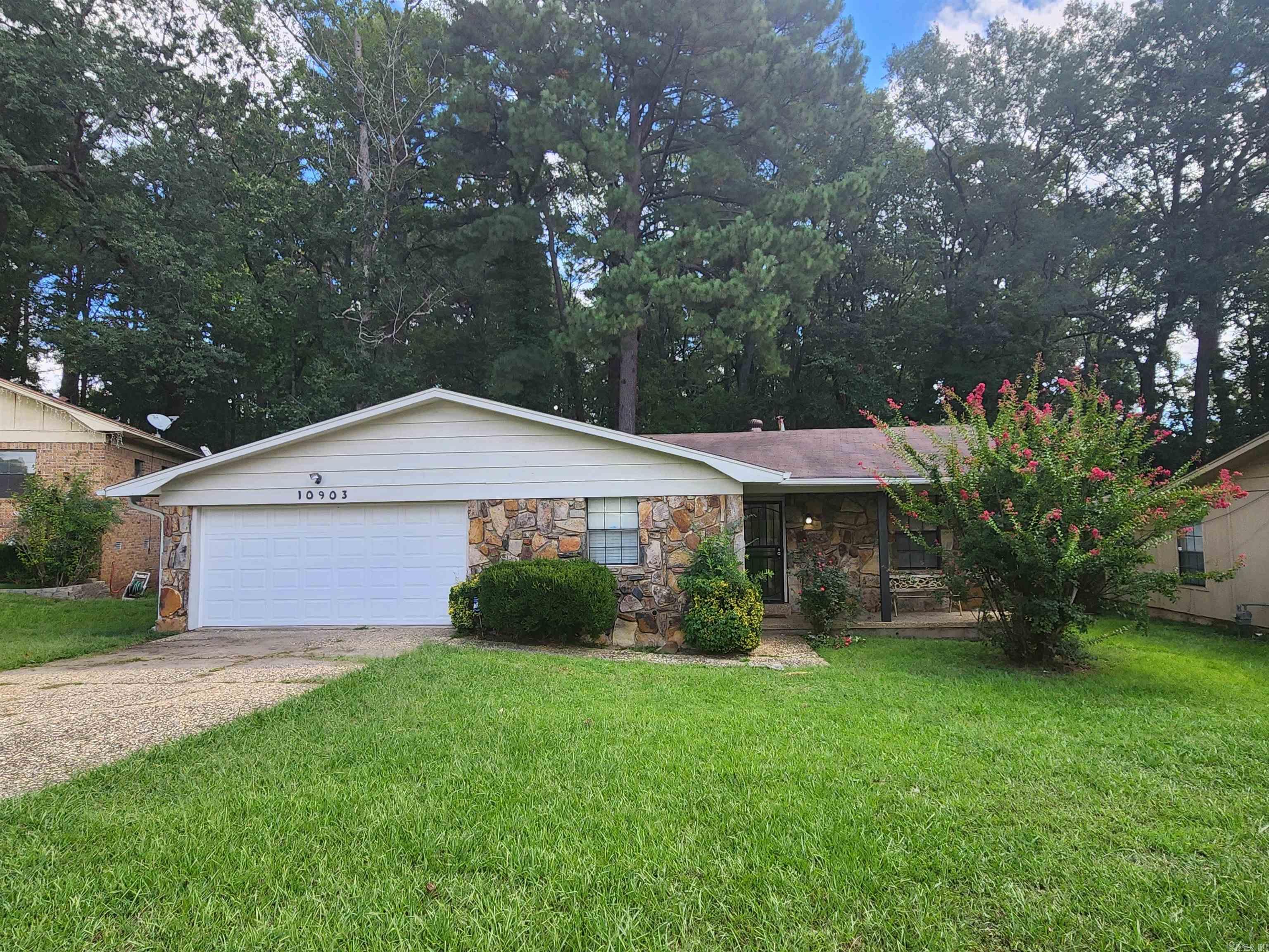 Beautifully Refreshed 3 Bedroom 2 Bathroom Home in Mabelvale! 2 Car Garage. Nice Level Lot w/ Fenced In Back Yard. Deck. Spacious Kitchen w/ Stainless Appliances. Lovely Dining Room. New Paint and Flooring