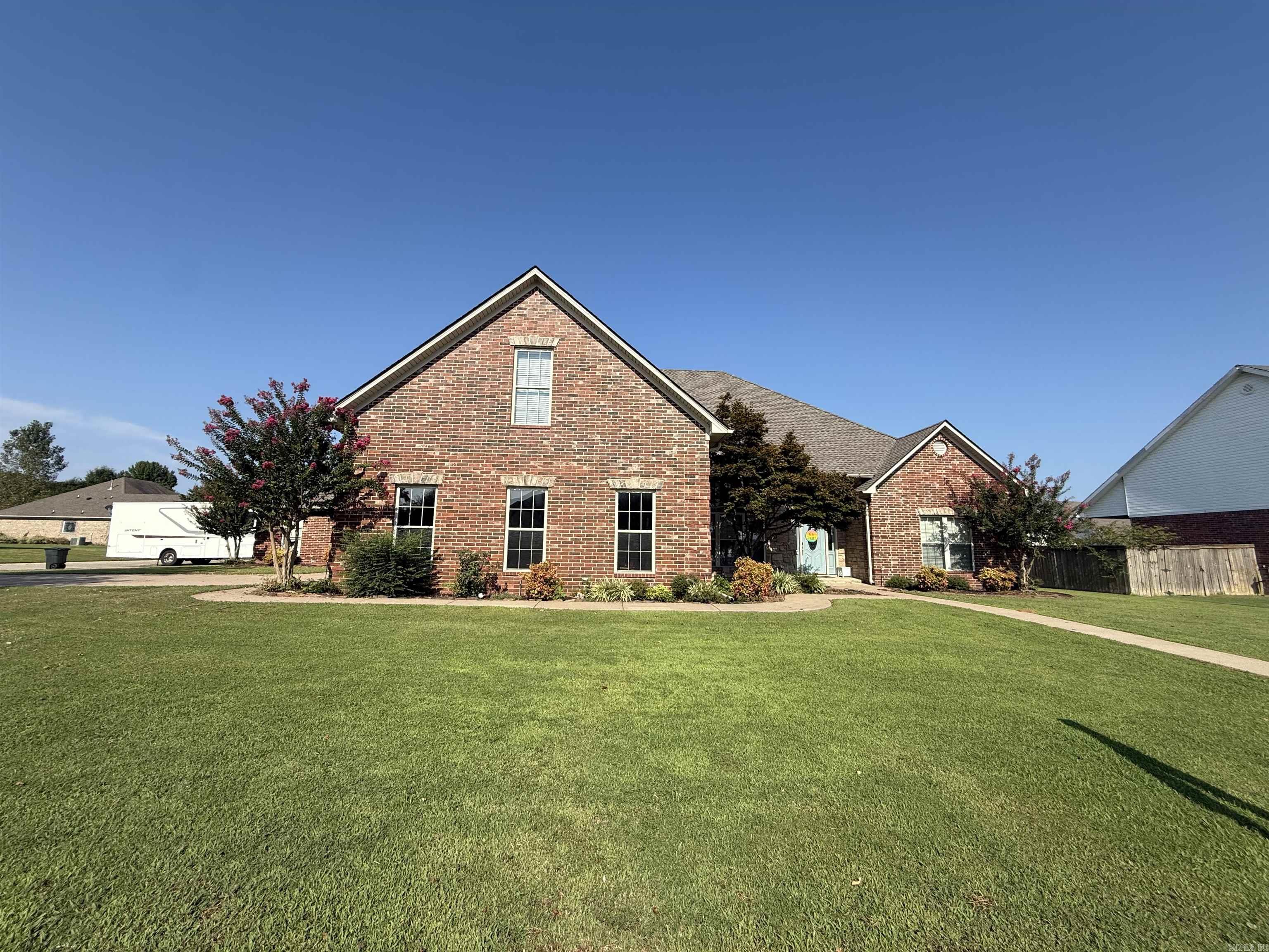 With 3845 sq ft, this stunning 5 bedroom 3.5 bath home has everything you need, but the separate game/theatre room gives you another 800+ sq ft of bonus space to take this home to the next level! Sitting on almost a half an acre corner lot in Quail Hollow, you will find an amazing great room with vaulted wood ceiling, huge rock fireplace and custom built-ins. There is a formal dining room, and absolutely charming eat in kitchen with brick floors, a gas cooktop, double ovens, island and breakfast bar. The spacious master suite has a double tray ceiling, his and her closets, jetted tub and separate shower. There are 3 other bedrooms downstairs with jack and jill bath. Upstairs you will find a loft area, bedroom, and office/flex room and a full bath. Outside you will find a shop with electricity, a garden area, covered porch and more. Extra drive is perfect for RV or guests. NEW ROOF Dec. 2024!