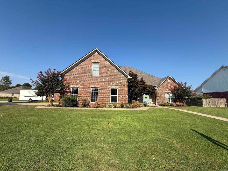 With 3845 sq ft, this stunning 5 bedroom 3.5 bath home has everything you need, but the separate game/theatre room gives you another 800+ sq ft of bonus space to take this home to the next level! Sitting on almost a half an acre corner lot in Quail Hollow, you will find an amazing great room with vaulted wood ceiling, huge rock fireplace and custom built-ins. There is a formal dining room, and absolutely charming eat in kitchen with brick floors, a gas cooktop, double ovens, island and breakfast bar.  The spacious master suite has a double tray ceiling, his and her closets, jetted tub and separate shower.  There are 3 other bedrooms downstairs with jack and jill bath.   Upstairs you will find a loft area, bedroom, and office/flex room and a full bath.  Outside you will find a shop with electricity, a garden area, covered porch and more. Extra drive is perfect for RV or guests.  NEW ROOF Dec. 2024!