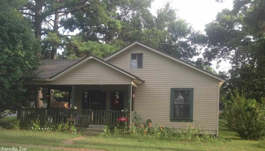 SELLER'S RELOCATING. This property is a block from the Lower White River, and if that isn't good enough you're a block from Dondie's. Nice Corner lot, wrap around porch for those breezy mornings and afternoons. A few rooms need a little TLC but property has potential. Ceiling has to be installed in the den. New metal roof installed in April 2014. Again, sellers are relocating and want to sale as is.