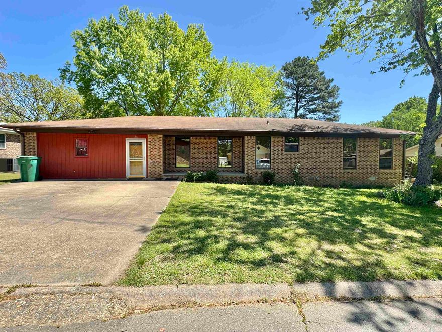 Sold before listed. Spacious home with 3 good sized bedrooms, 2 full baths and 2 living spaces. 2 car garage was converted into a large living space. Kitchen with solid wood cabinetry includes electric stove and stainless microwave. Lovely covered deck with views of the big backyard! ***Both bathrooms need complete remodel and HVAC ductwork must be replaced due to water intrusion. There is not flooring in the bedrooms, hallway, living room and dining room.