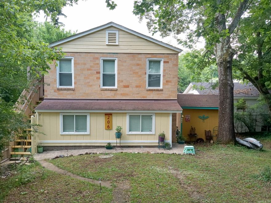 Do you want to live in a treehouse? Check out this one of a kind, well maintained home! It has a screened-in balcony, treetop views, outdoor storage, is walking distance from the Pullman trailhead and in a prime location for visiting downtown hot springs - while also providing tons of quiet privacy. Seller is offering concessions toward changes to the spiral staircase. The house is very close to Rick's Pond, DeSoto Park, Gulpha Gorge and so much more! It has a newer roof, updated plumbing, new electrical panel and other items were serviced recently such as the hot water heater, dryer, roof vent and faucets. Make your offer today! The trees have been trimmed and it's ready for you to move in! All of the appliances convey.