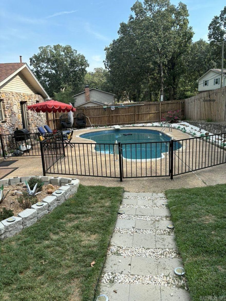 MOVE IN SPECIAL! HALF OFF FIRST MONTH’S RENT! Charming 3BD/3BA in WLR walking distance to Pulaski Academy that is waiting for you to call home. Plenty of living space downstairs with an office perfect for anyone who works from home. Kitchen accented with blue cabinets and a modern backsplash. 3 Bedrooms upstairs with ceiling fans and plenty of closet space. Large privately fenced yard with an inground pool ideal for those hot summer months. This property is managed by Hoffman Team so beware of scammers - we will never ask you to Cashapp us money. The lease for this property is for 18 months to 2 years with a 3% increase after the first year. Income must be 3x the amount of rent. Deposit, first month’s rent, and the $50 administration fee due before move in. This property does not accept section 8. Showings are by appointment only, please contact the office to schedule an appointment.