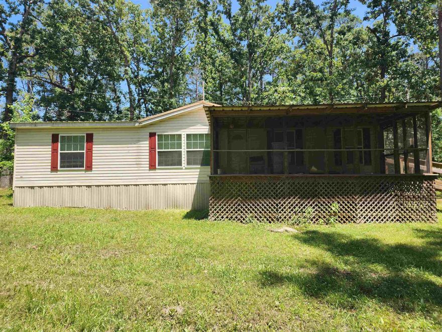 Wonderful home with a split floor plan, lots of privacy and wiggle room for entertaining and gardening on a cul-de-sac. This home is handicap accessible with large doors and shower.  2 ramps, Open floor plan to the large kitchen island with tons of storage and pullouts, additional home office or sitting room, Covered screened in porch, includes backup Generac Generator, Large trees, small shed with lean-to, washer and dry can be conveyed depending on offer. No disclosure and sold as is,  as seller did not live on property.