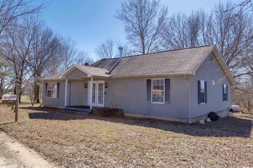 If you are looking for an affordable home on the North side of Harrison that has 5 acres, a shop and a pond, you have found it! This 1872 Square foot home with 2 large bedrooms, 1.5 Baths, a very large kitchen, huge living room and a nice screened in porch area is just exactly what you are looking for. As a bonus for the guys, it has a 20x24 shop building with a wrap around porch, electric and a Schrader wood stove for heat!! Nice size pond for fishing for the kids, great yard with shade trees all around makes for the perfect location North of Harrison and that much closer to Branson!! Take a look at this one today before it's gone!!